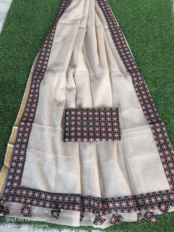 Kota Doriya Saree with Ajrakh Border.